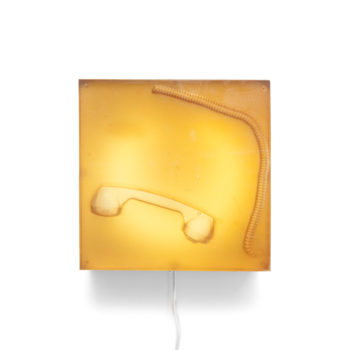 Jil Weinstock, M. McCann’s Landline Receiver, 2015, Urethane rubber, mixed media, stainless steel frame and fluorescent light, 12 x 12 inches