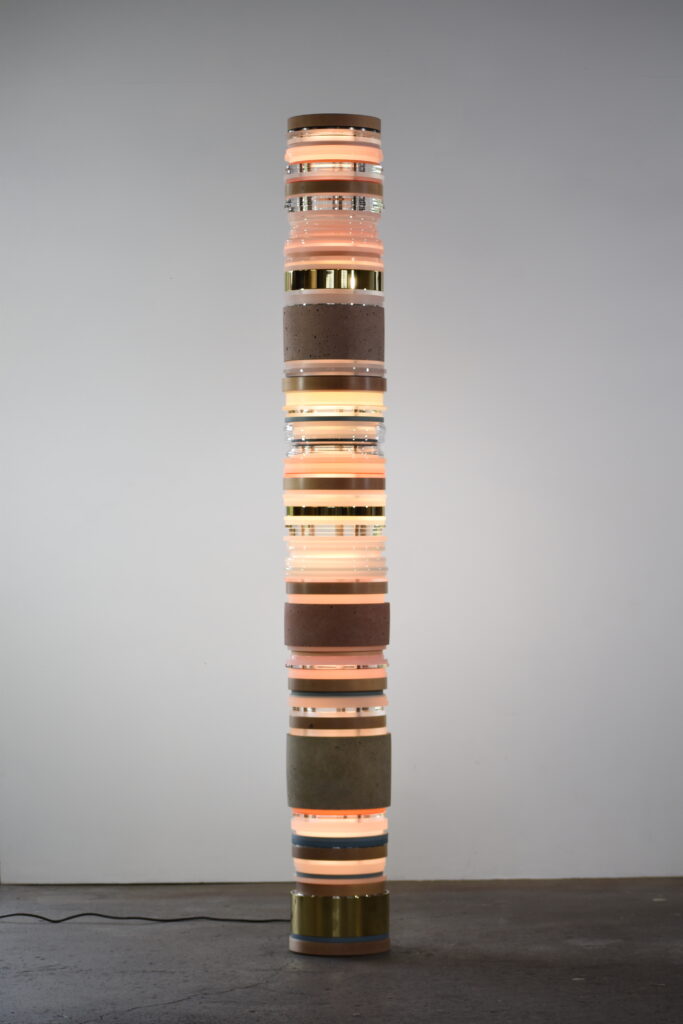 Matt Gagnon, And Also, 2024, Concrete, wood, bronze, painted MDF, acrylic, steel and LED, 84 x 10 1/2 x 10 1/2 inches