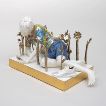 Claire Partington, Narcissus, 2022, Glazed earthenware and gold plated brass, 11 x 15½ x 10 inches