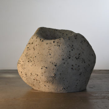 Matt Gagnon, Red Volcano, 2023, Mortar mix, stones, acrylic, glass, steel, wood armature and LED, 30 x 33 x 26 inches